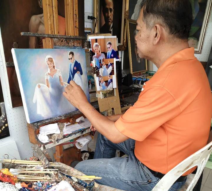 Artist working in his workshop
